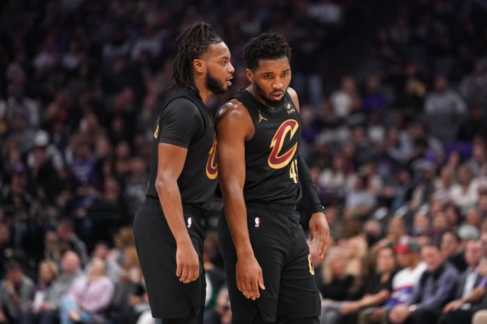 Nov 13, 2023; Sacramento, California, USA; Cleveland Cavaliers guard Darius Garland (10) talks with guard Donovan Mitchell (45) before a free throw attempt against the Sacramento Kings in the second quarter at the Golden 1 Center.